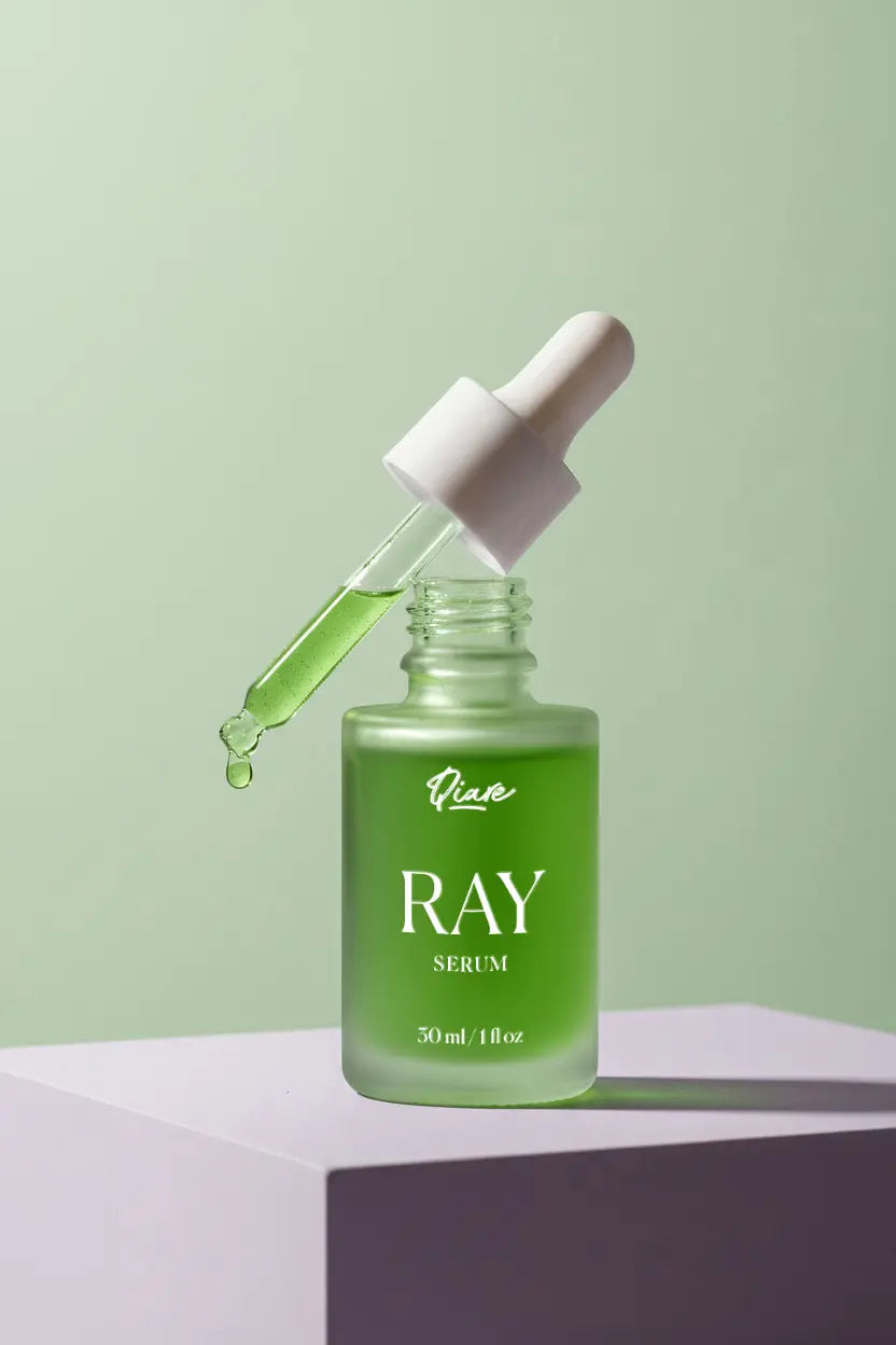QIARE Ray Brightening Serum bottle with fruit-based exfoliation
